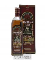 Bushmills 16 years Of. Matured in three woods 